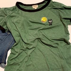 H. I. P. Green short sleeved T-shirt, smiley face